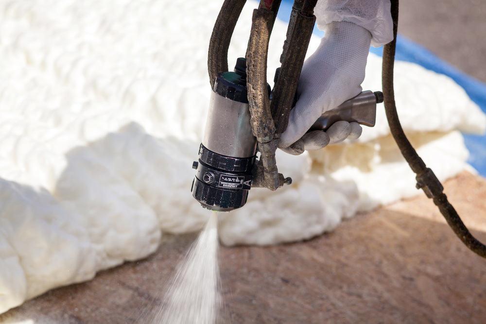 Technician,Spraying,Foam,Insulation,Using,Plural,Component,Spray,Gun